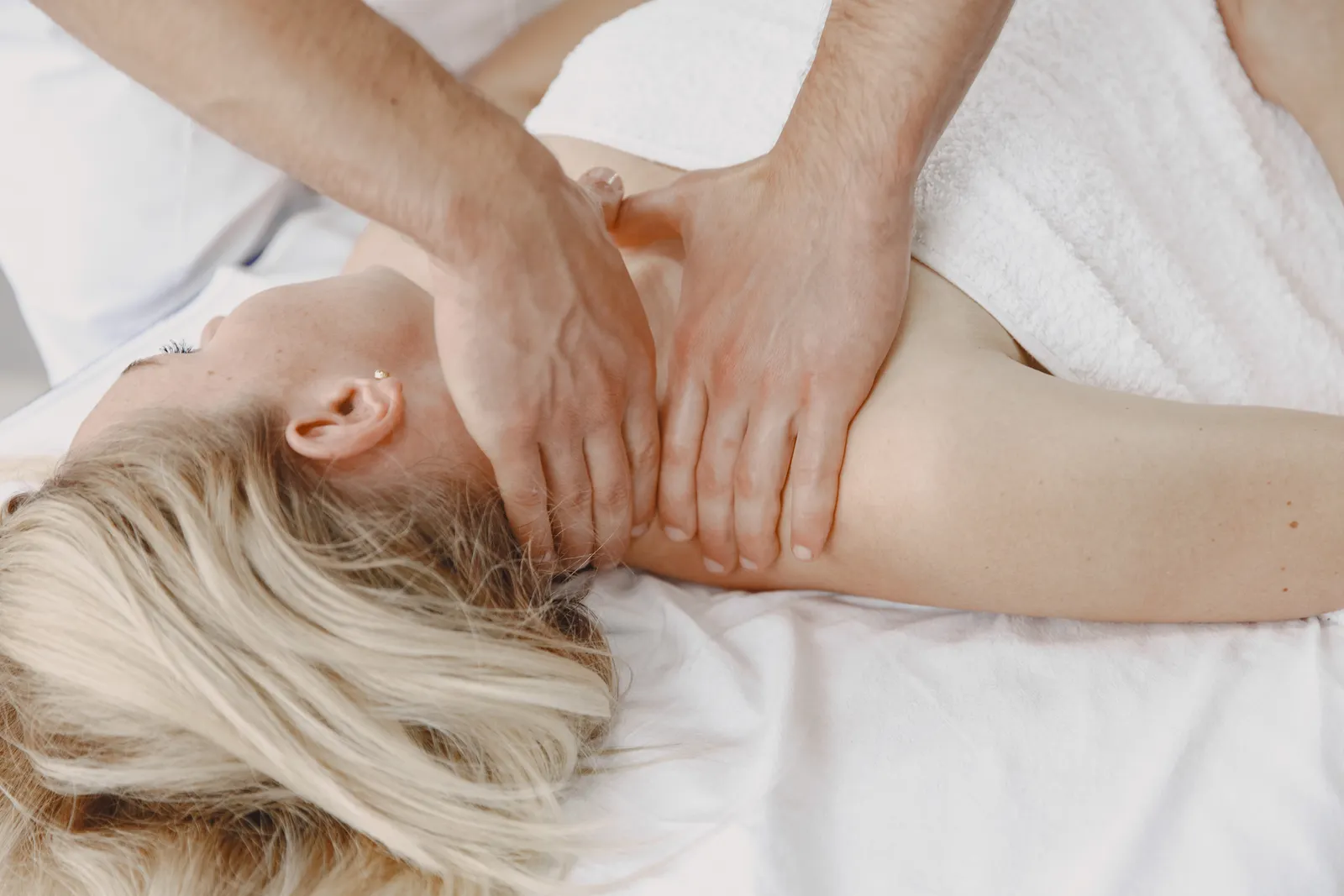 Back neck and shoulder therapy massage with close, careful attention